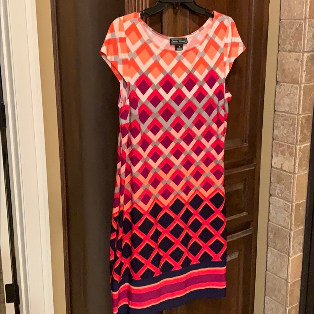 Women’s dress.  Worn 1 time.  95% polyester